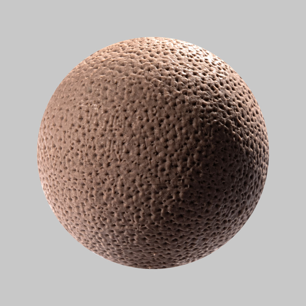 Textured sphere resembling human skin, ideal for use with sculpture clay and texture tools in clay modeling projects.