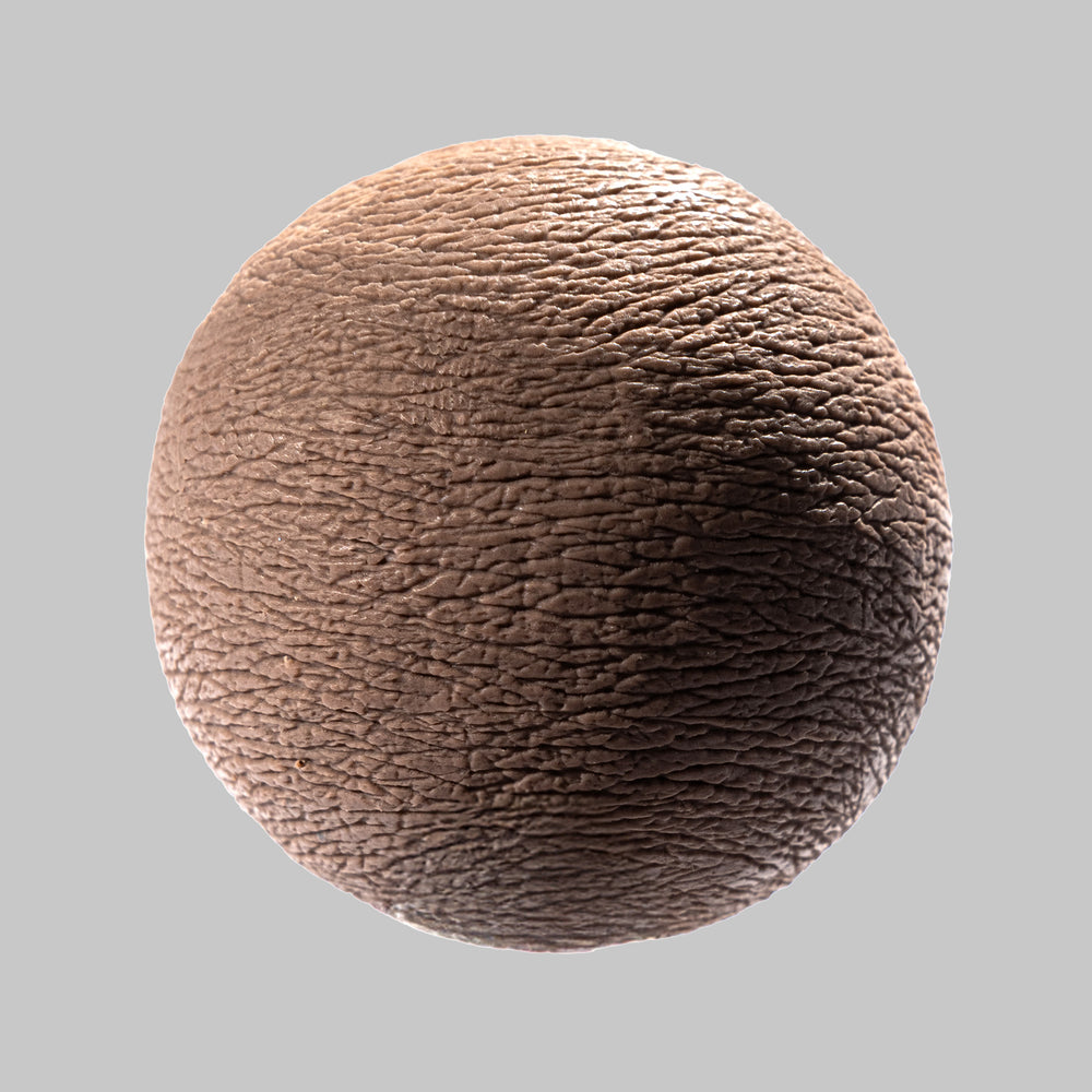 Textured sphere resembling human skin, ideal for clay sculpture and texture tools applications.